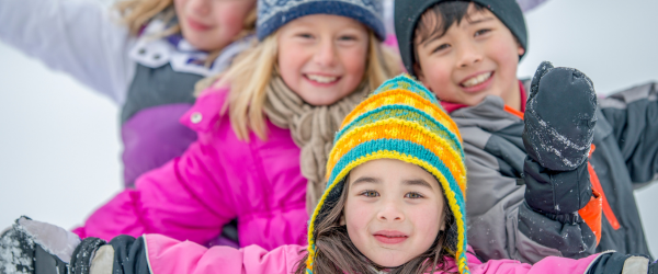 kids playing in the snow