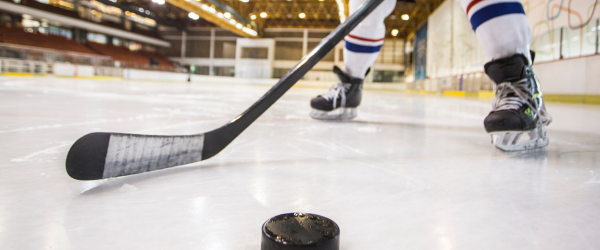 women playing hockey